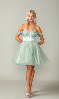 Woman wearing a light green off-shoulder dress with floral details on a plain background