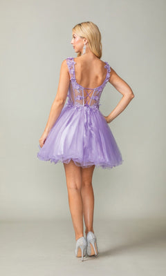 Woman wearing a purple dress with a sheer back on a plain background