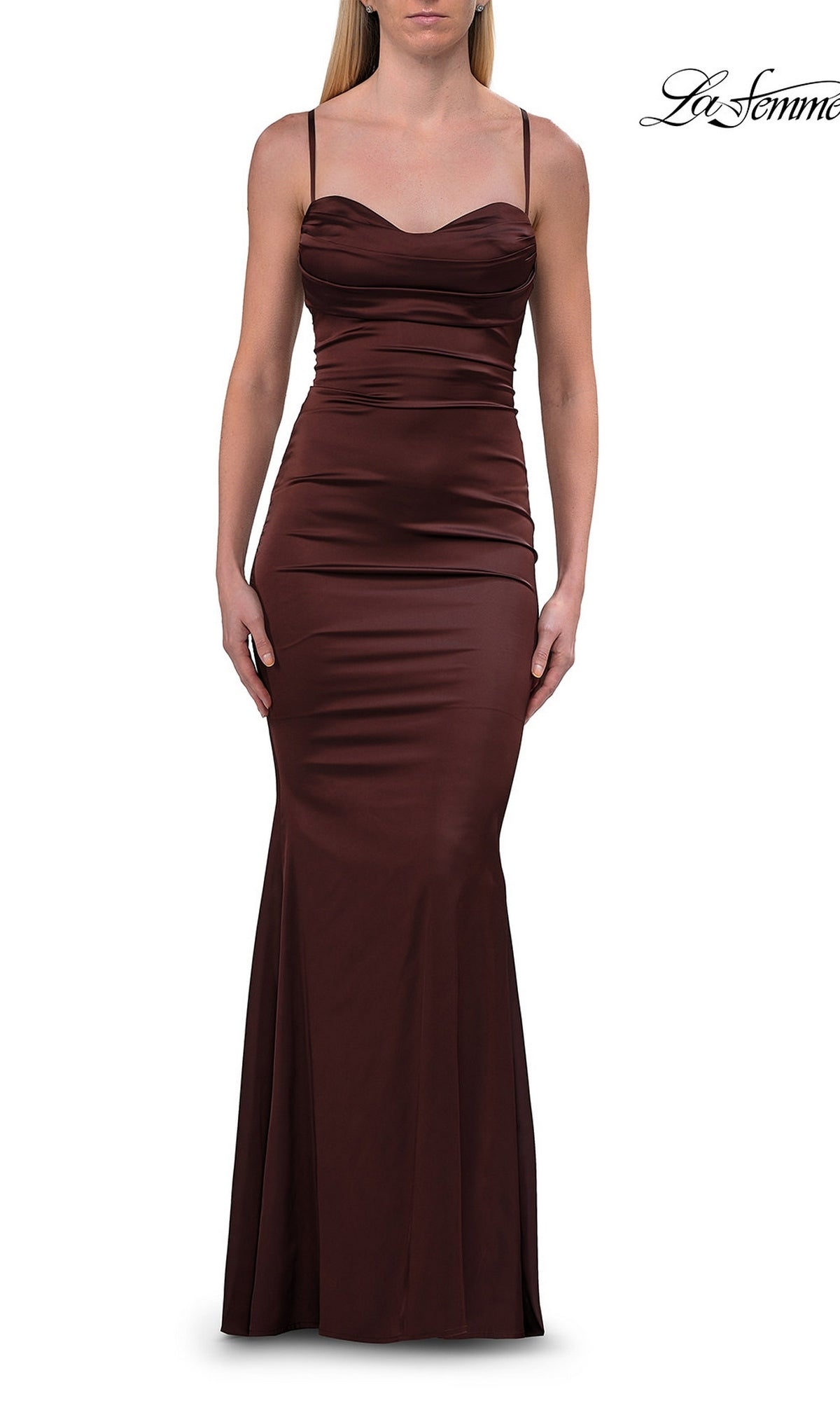 A woman models the La Femme 33764 Criss-Cross Open-Back Prom Gown in chocolate—a floor-length, sleeveless formal dress crafted from dark brown satin, featuring thin straps, a fitted bodice, and a subtle mermaid silhouette—against a plain white background.