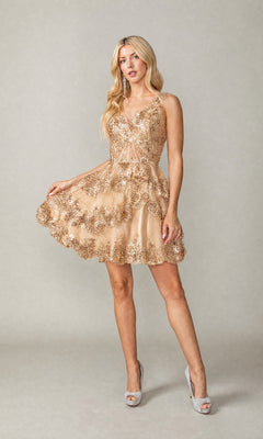 A woman stands posing against a plain light background, wearing the Dancing Queen 3376 Sparkly Tiered Homecoming Dress in gold. This sleeveless mini dress features an elegant corset bodice that beautifully accentuates her silhouette with its flared A-line skirt, paired with silver high-heeled shoes.
