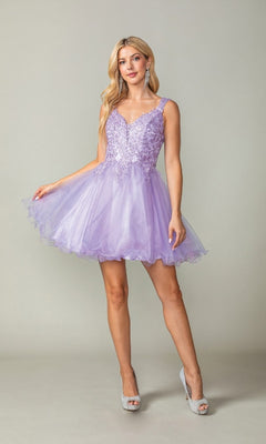 Woman wearing a short poofy lilac purple dress with a lace bodice in front of a plain background