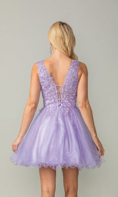 A woman is shown from behind wearing the Dancing Queen 3377, a sleeveless lavender tulle babydoll homecoming dress with a flared skirt and lace-up back.