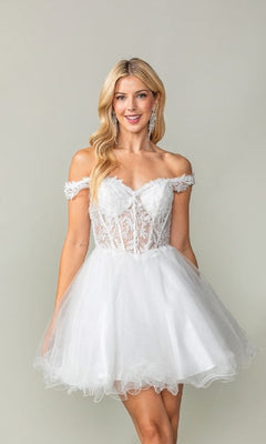 Woman wearing a white short poofy dress against a plain background