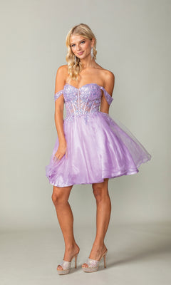 A woman models the Dancing Queen 3383 Short Corset Homecoming Dress, featuring an off-the-shoulder lavender sequin bodice and flared tulle skirt, paired with high heels against a plain backdrop.