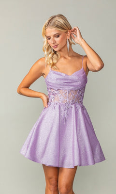 Woman wearing the Cowl-Neck Short Glitter Homecoming Dress 3386 in lavender, featuring a sleeveless sheer lace bodice and flared skirt, poses with one hand touching her hair.