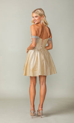 Woman models the Fringed Off-Shoulder Short Homecoming Dress 3392, featuring a corset bodice, lace-up back, and silver fringe details, posing facing away while looking over her shoulder.