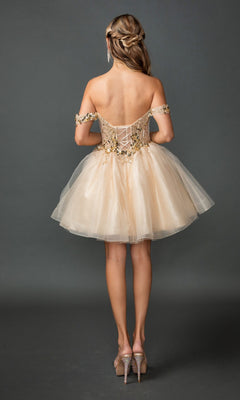 A woman, photographed from behind against a gray backdrop, wears the Off-Shoulder Glitter Hoco Dress: Dancing Queen 3408—a short, gold tulle homecoming dress with floral embellishments and an off-the-shoulder neckline.