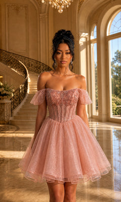 A woman in a rose gold, off-the-shoulder glitter tulle short homecoming dress (Dancing Queen 3439) stands in an elegant hall with large windows, a marble floor, and a curved staircase in the background.