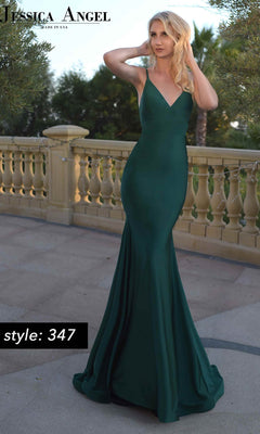 A woman stands outdoors in a sleeveless, floor-length emerald green Open-Back Long Prom Dress: Jessica Angel 347 with a fitted bodice and flared skirt. The text "style: 347" appears in the lower left corner.