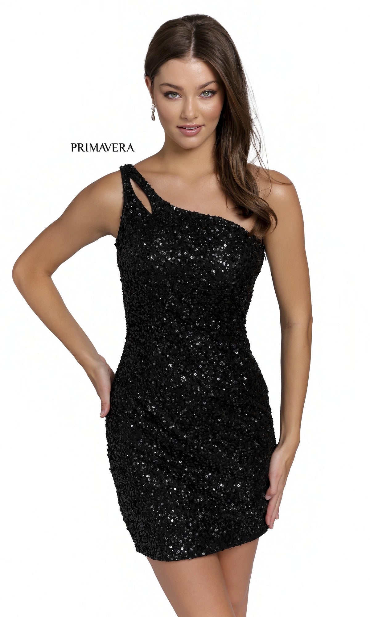 A woman models the One-Shoulder Short Sequin Homecoming Dress 3573, featuring a black, open-back design with cutout detail and sparkly sequins, set against a plain white background.