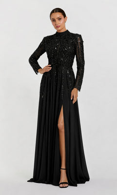 Model wearing the Long Formal Dress: Mac Duggal 37037, a stunning black gown featuring sequin details, long sleeves, and a high slit. The look is completed with black strappy heels against a plain white background.