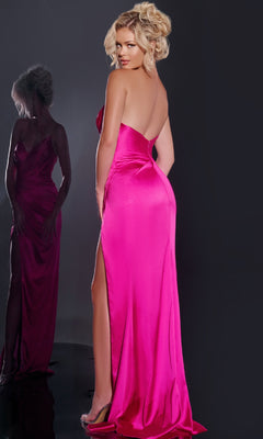 A woman in the Jovani 37079 long prom dress, a bright pink strapless gown with a high slit, stands with her back to the camera, looking over her shoulder as her reflection appears in the mirror.