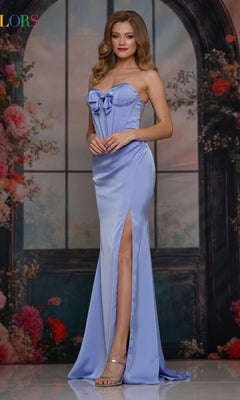 A woman wearing the Strapless Tight Satin Prom Dress: Colors Dress 3710 in light purple, with a bow detail and thigh-high slit, poses before a floral and windowed backdrop.