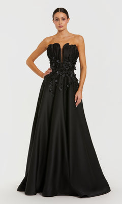 Black strapless gown with floral details on a white background