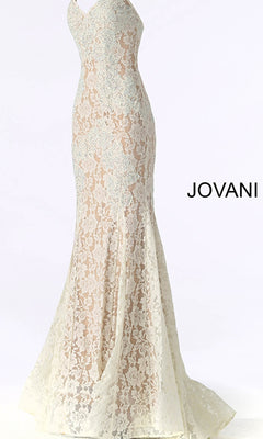 The Jovani Long Prom Dress 37334 is a form-fitting, floor-length gown in cream lace with a floral pattern, featuring a subtle train. This elegant formal dress is pictured from the side.