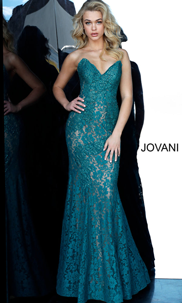 A woman poses in the Long Prom Dress 37334 by Jovani—a teal, strapless, floor-length formal dress with a sweetheart neckline, fitted bodice, lace fabric, and flared hem. The word 