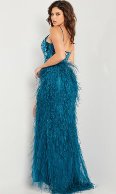 A woman models the Jovani 37435 Feather Long Sequin Prom Dress, featuring a fitted teal silhouette with spaghetti straps, lace-up back, and feathered skirt detailing, against a plain light background.
