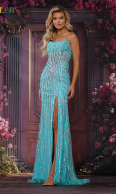 A woman in Colors Dress 3761, a turquoise strapless long prom dress with silver sequins and a thigh-high slit, stands before a floral and column backdrop.