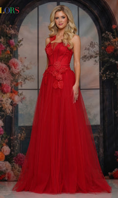 A woman stands before a floral archway in the Long Prom Dress: Colors Dress 3796, featuring 3D floral appliques and an elegant a-line tulle skirt.