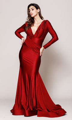 A woman models the Amelia Couture 381 Long Sleeve Sleek Formal Dress in deep red, featuring a fitted silhouette and deep V-neckline, against a plain light background.