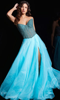 A woman models the Jovani 38179 long prom dress, featuring a strapless beaded corset bodice and a flowing light blue skirt with a high slit, posed against a black background.