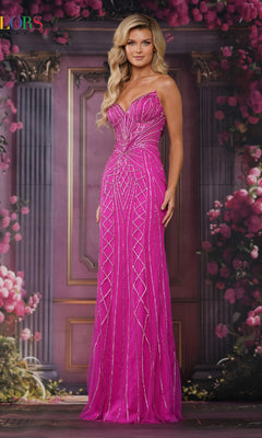 A woman wearing the Colors Dress 3825, a bright pink long prom dress with hot-stone embellishments and geometric patterns, stands before an ornate doorway framed by pink flowers and greenery.