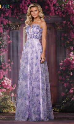 A woman poses for a formal portrait in the Colors Dress 3831, a long, sleeveless lavender prom gown featuring delicate 3D floral appliques, standing before pink flowers and classic columns.