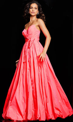 A woman poses gracefully against a black background in the Jovani Long Taffeta Bubble Prom Ball Gown 38382, a strapless bright pink dress.