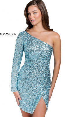 A woman wears the Faux-Wrap Beaded One-Sleeve Mini Party Dress 3860, featuring light blue sequins, an asymmetrical neckline, and a thigh-high slit, as she stands against a white background.