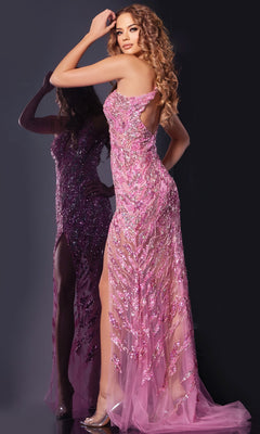 A woman wearing the Jovani 38769 long pink sequin prom dress, featuring a floor-length skirt and thigh-high slit, stands before a dark background with her reflection beside her.