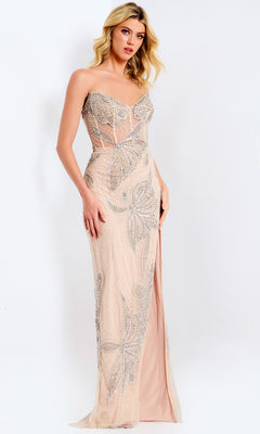 A woman stands against a plain white background wearing the Jovani 38812 long prom dress in nude/silver, featuring a strapless sheer bodice, floor-length design, intricate silver beadwork, and a couture silhouette.