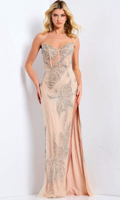A woman poses against a white background in the Jovani 38812 Long Prom Dress—a nude, strapless, floor-length gown with a sheer bodice, silver sequin embellishments, and a thigh-high slit.