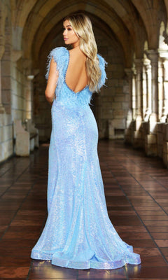 A woman in the Ava Presley 38896 Feather Long Sequin Prom Dress with an open back stands on a tiled floor in an arched stone hallway, facing away from the camera.