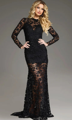 A woman poses against a plain background in the Jovani 39034—an elegant, long-sleeved formal evening gown featuring a form-fitting silhouette, sheer lace skirt, and delicate beaded lace embroidery.