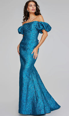 A woman stands against a plain background wearing the Jovani 39113, a long formal dress featuring an off-the-shoulder, floor-length fitted silhouette in teal metallic jacquard with short puff sleeves and a subtle textured pattern.