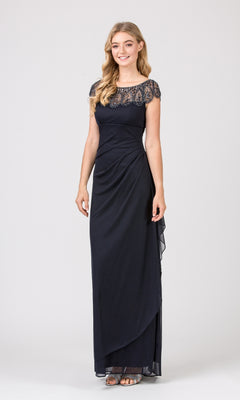 Woman standing and smiling in the Cap-Sleeve Long Formal Dress: Eureka 3927—a floor-length navy blue gown with lace bodice and cap sleeves, paired with silver sandals, her hair in loose waves.