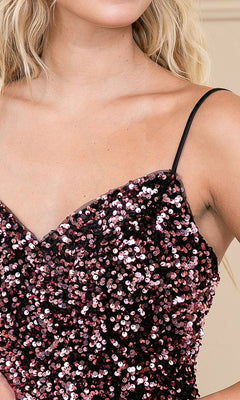 Close-up of a person in the Short Sequin Strapless A-Line Prom Dress 395S, featuring pink and black sequins for a striking, modern look.