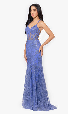 A woman models the Long Glitter Prom Dress: Blondie Nites 3960BN—an elegant, floor-length lavender gown with sparkling sequins, thin straps, corset waist, and sheer paneling—posing against a plain white background.