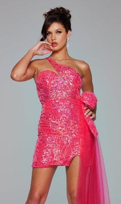A woman poses in the Jovani 39705 Side-Bow Short Sequin Hoco Dress, featuring a one-shoulder design with a sheer pink sash, against a plain gray background.