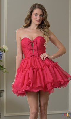 A woman is indoors wearing the Short Homecoming Dress: Colors Dress 3993 in hot pink, featuring a strapless ruched bodice and a tiered chiffon A-line mini skirt with playful ruffled layers.