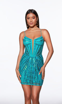 A woman poses against a white background wearing the Alyce 40016 short homecoming dress—a fitted turquoise sequin mini dress with thin straps, a corset bodice, and geometric patterns.
