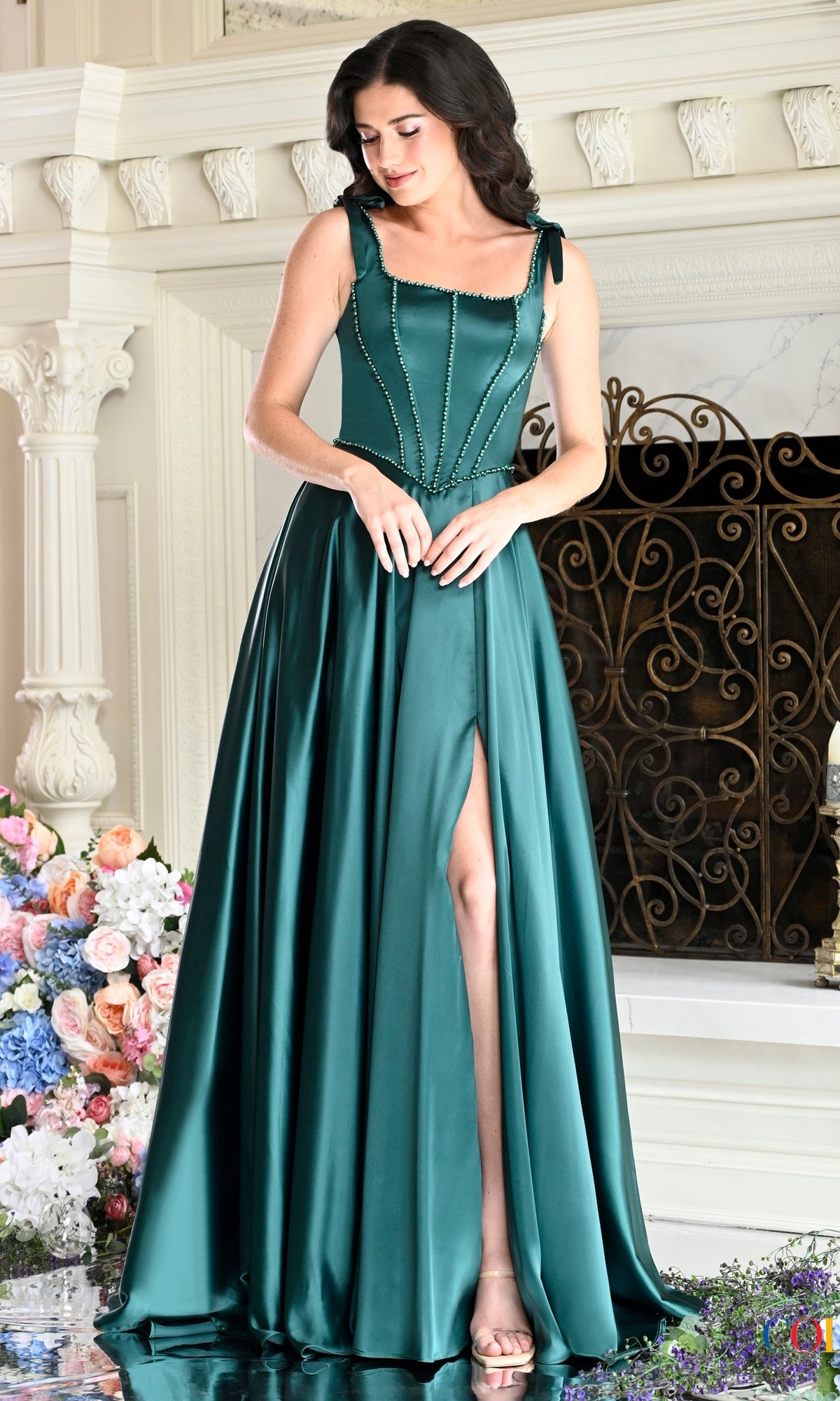 Deep green Colors Dress 4006 floor-length corset prom dress with a bodice, thin straps, and a thigh-high side slit.