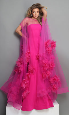 Wearing the Long Formal Dress: Jovani 40092, a person poses against a plain gray background; the bright pink gown features a sheer overlay adorned with flower embellishments.