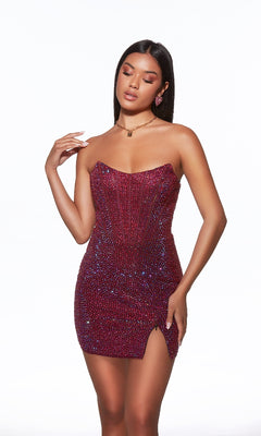 A woman models the Alyce 40104 short homecoming dress, a strapless red sequin bodycon style with a slim side slit, standing against a plain white background.