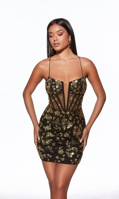 Woman modeling the Alyce 40126 Short Homecoming Dress, a black mini dress with gold floral accents, thin spaghetti straps, and a sheer corset bodice, against a white background.