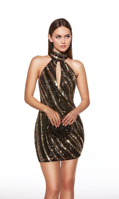 Model in the Alyce 40127 short homecoming dress—black with gold and silver sequin stripes, halter neckline, and front keyhole cutout—stands against a white background.