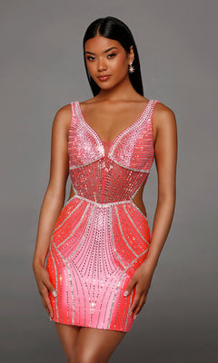 Woman in a fitted, sleeveless neon pink and silver Short Homecoming Dress: Alyce 40176, featuring rhinestone detailing, posing against a plain gray background—an elegant and eye-catching choice perfect for any occasion.