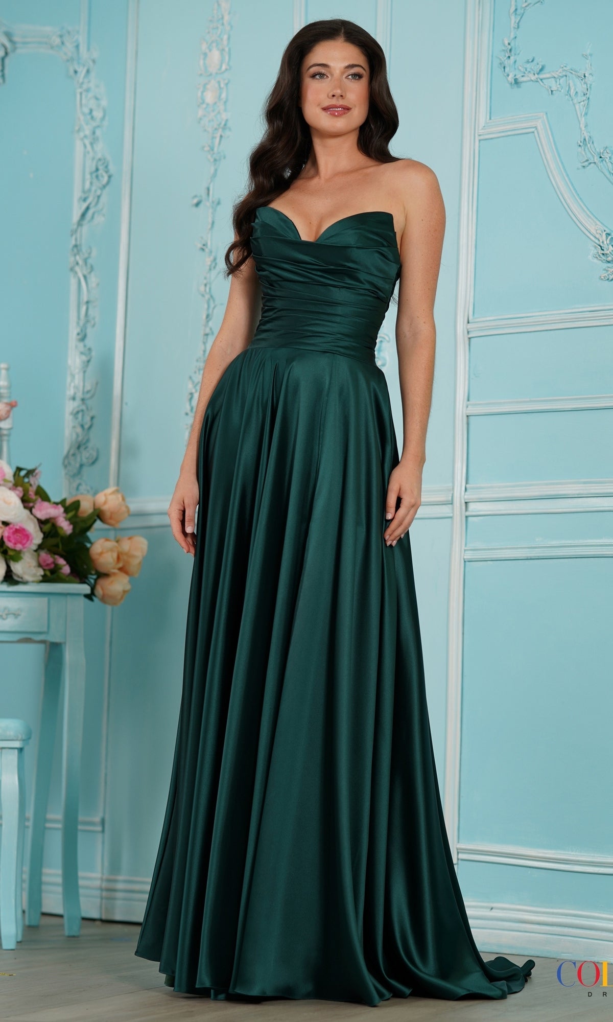 Long Prom Dress: Colors Dress 4026 in deep green, featuring a strapless, ruched bodice and a full, floor-length skirt.