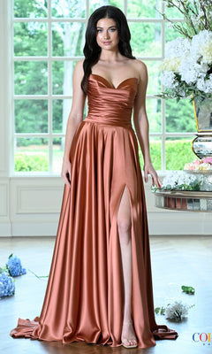 Long Prom Dress: Colors Dress 4026 in a floor-length, terracotta-colored strapless design featuring a draped silhouette, a sweetheart neckline, and a high side slit.
