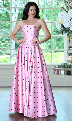 Retro Polka Dot Prom Dress: Colors Dress 4035, a strapless, floor-length pink polka-dot prom dress with a high side slit.